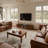 Devona Minimalist Low Cabinet with Sliding Glass Doors & 3 Storage Cubbies