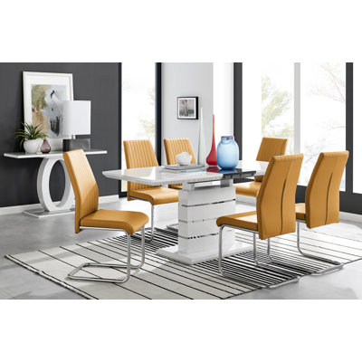 Grand ensemble de salle à manger extensible Everson avec 6 chaises rembourrées en similicuir