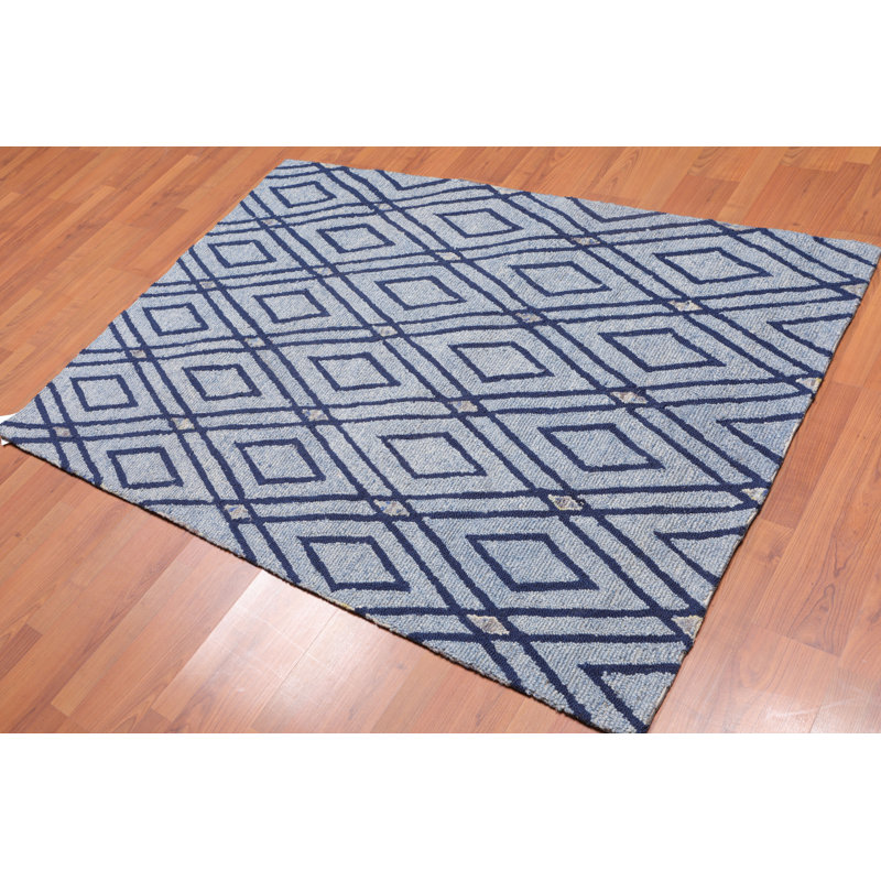 Tapis bleu ciel en laine touffeté fait main Delosreyes