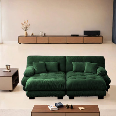 Causeuse moderne surdimensionnée avec accoudoirs rembourrés ronds et repose-pieds avec coussins lombaires et coussins décoratifs