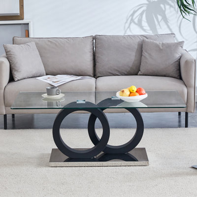 Table basse de style moderne avec plateau en panneau de fibres à densité moyenne avec base noire, convient aux salons et aux salons, avec des dimensions de produit de 47,2 x 25,6 x 17,8 pouces.