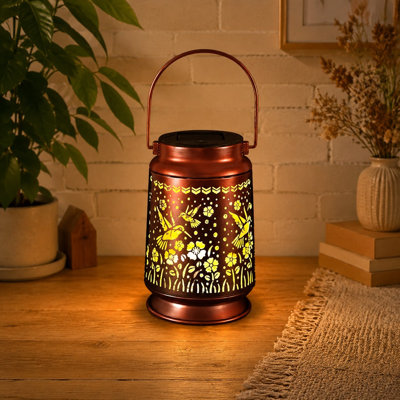 Designed as hummingbird garden decor, this waterproof metal solar hanging lantern can be displayed on patios, in yards, along pathways, in landscapes, or at festivals and given to women, Mom, or Grandma. For outdoor use.