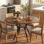 Table de salle à manger ronde de 107 cm de diamètre avec tablette de rangement et piètement en métal pour 4 personnes.-1111857619-1113032980