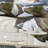 White Spots Snowfields In Gullies - Landscape Printed Throw Pillow