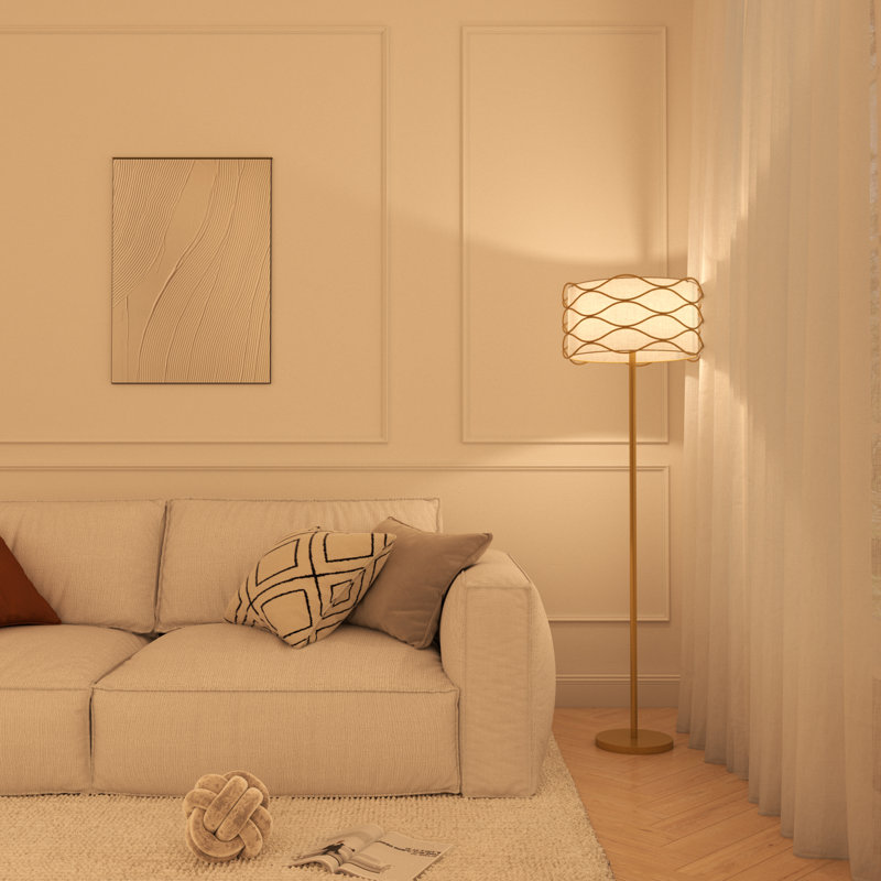 Lampe sur pied moderne avec décor métallique ondulé et abat-jour tambour en tissu