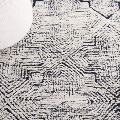Friedi Tufted Wool/Pet Yarn Geometric Rug in Ivory/Black