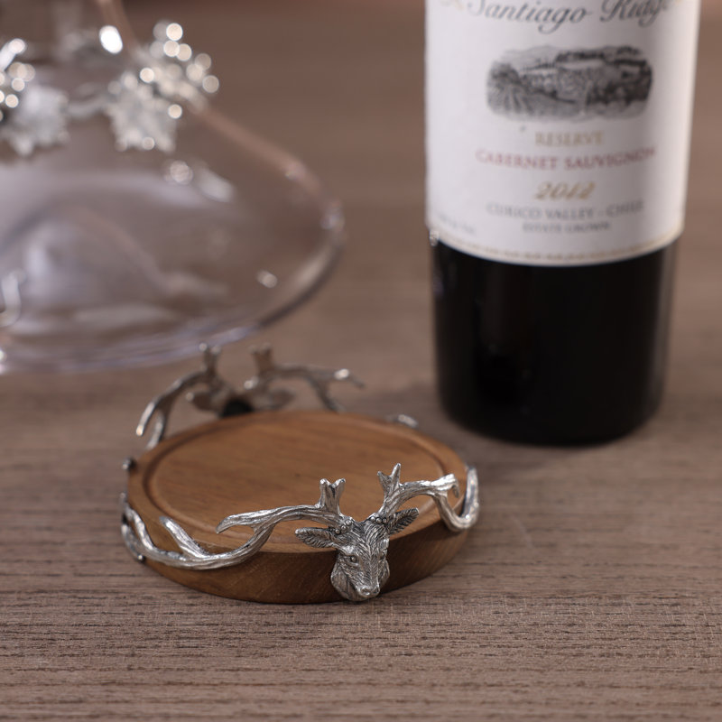 Dessous de verre St. Anton en bois et étain, orné d'une tête de cerf