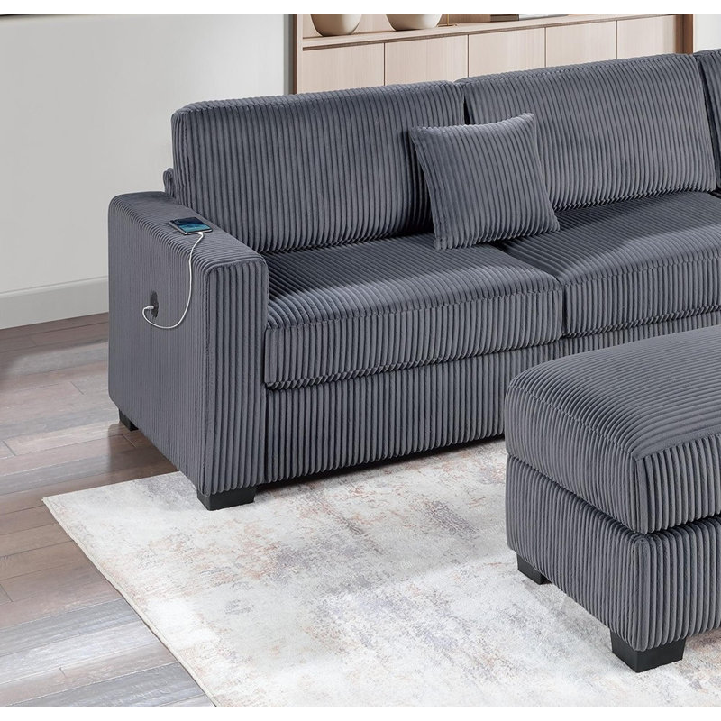 Sectional sofa with chaise longue and footstool