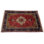 Pirley Oriental Area Rug in Red