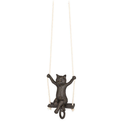 Figurine de chat balançant