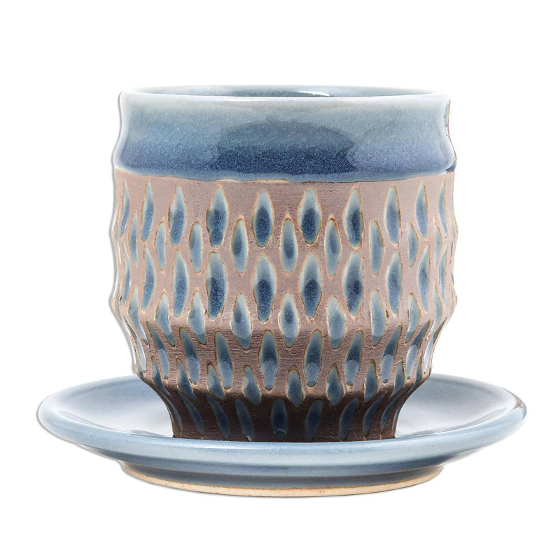 Ceramic Teacup and Saucer