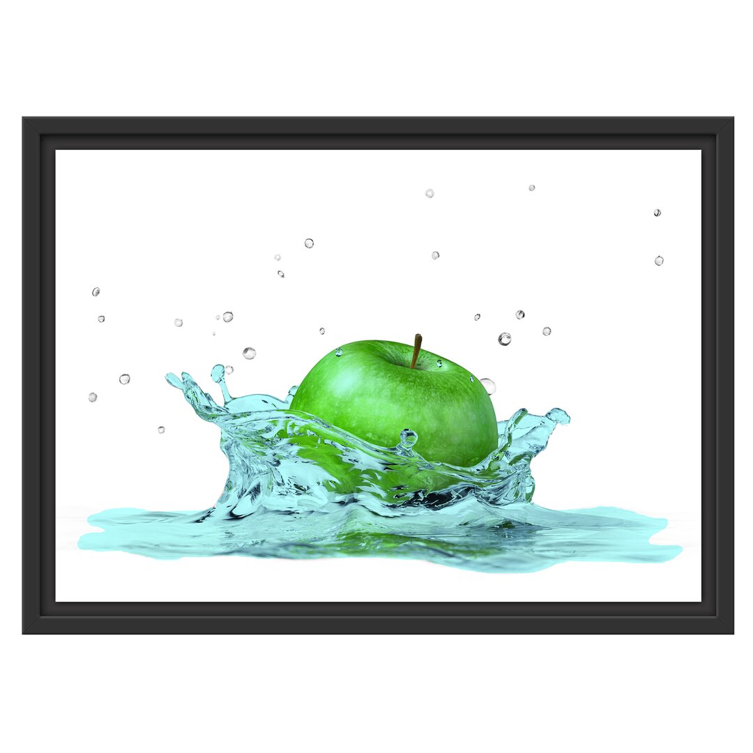 Gerahmtes Wandbild green Apple Apfel fällt in Wasser