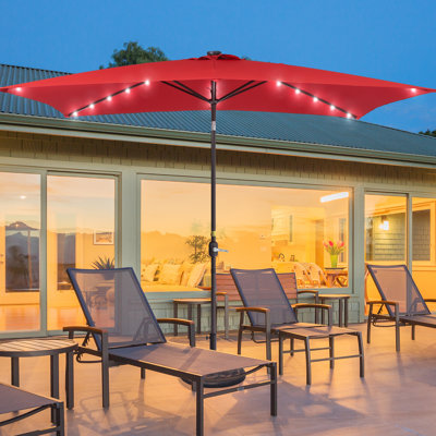 Upgrade Your Outdoor Space: 10×6.5FT LED Rectangular Patio Umbrella with UV Protection, Easy Tilt, and Wind-Resistant Features