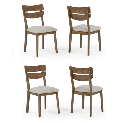 4 chaises incurvées confortables avec sièges rembourrés et meubles en bois riches