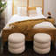 Jolo Ivory Faux Sheepskin Round Ottoman