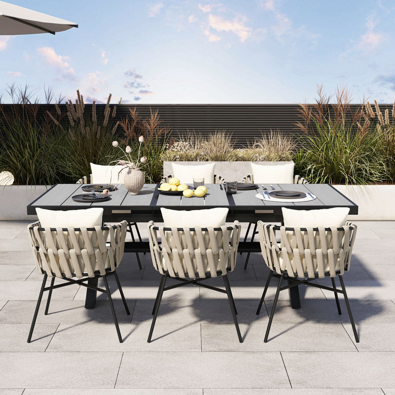 Discover Unmatched Flexibility In Alfresco Dining With Six Creatively Arranged Chairs Made Of Polyester Woven Tape And A Table That Expands From 62.9 To 82.6 Inches To Suit Any Occasion.