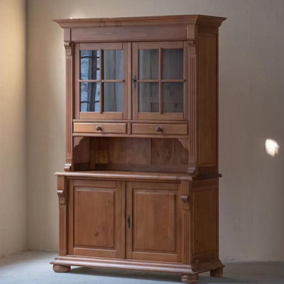 A vintage French solid wood carved cabinet