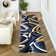 Catalan Abstract Navy Area Rug