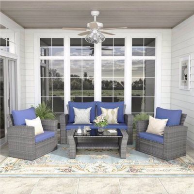 4-Piece Wicker Patio Conversation Set With Glass Table And Blue Cushions