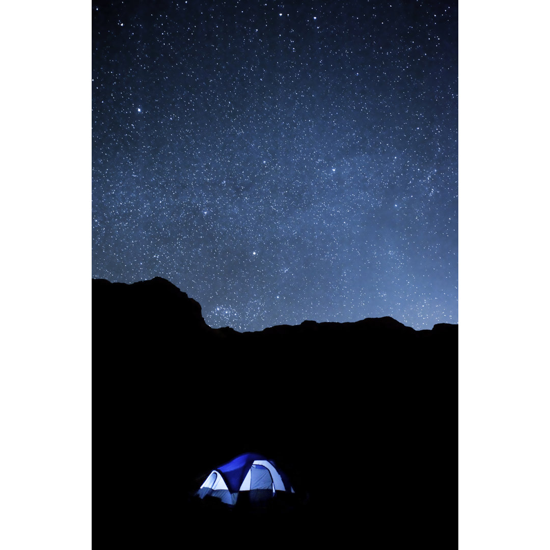 Desert Night Sky With Camping Tent And Silhouetted Cliffs von Phleum - No Frame Art Prints on Canvas