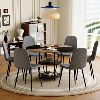 Ensemble de table et de chaises. Table de salle à manger circulaire moderne à épaisseurs - Rangement double couche. Combinée avec 6 chaises.