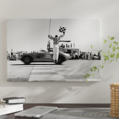 " 1960s Man Jumping Waving Checkered Flag For Winning Sports Car Crossing The Finish Line " Graphic Art Print