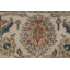 Très bon tabriz à motif floral orange; oriental