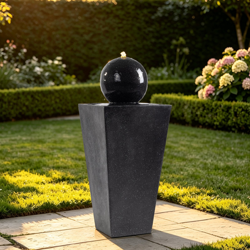 Fontaine à eau noire avec sphère lisse