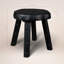 Ebonized Totem Stool (Short) ~ Inspired by its charred, sculptural presence, this 100% reclaimed stool embodies both primal craftsmanship and modern minimalism, like a relic reborn in ebony.