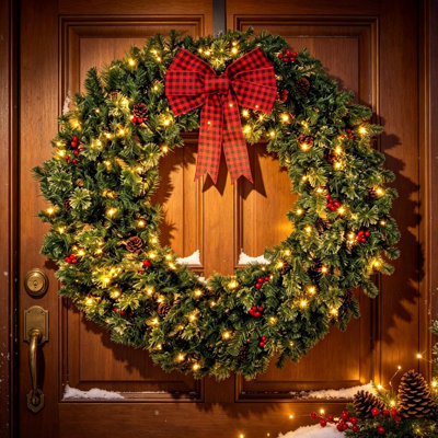 Couronne de Noël Crestwood Spruce pré-illuminée avec nœud, différents modes d'éclairage, baies rouges et pommes de pin