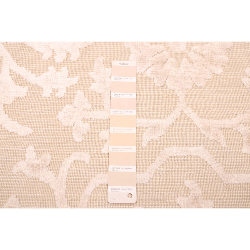Tapis ivoire Elysian 6 pi 8 po x 8 pi 1 po