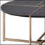 Table basse à finition noire et champagne