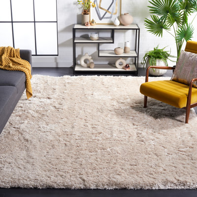 Gentas Hand Tufted Shag Solid Color Area Rug