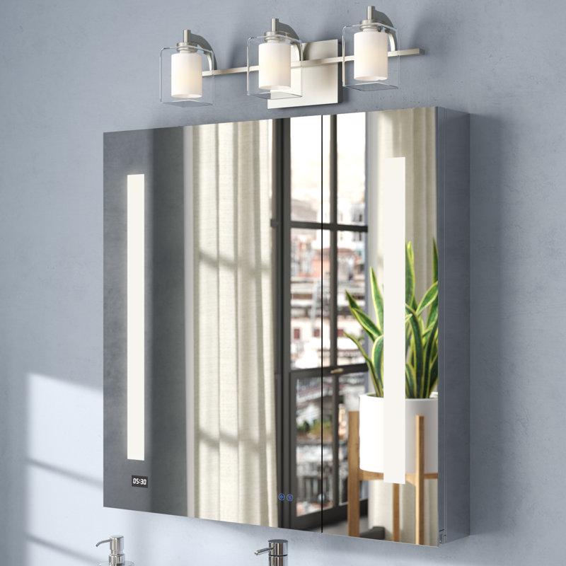 Donnelly l 36 po x H 30 po x P 5 po, désembueur d'armoire à pharmacie à DEL, miroir grossissant réglable verticalement éclairé par 3 lumières DEL, horloge numérique, prises de courant