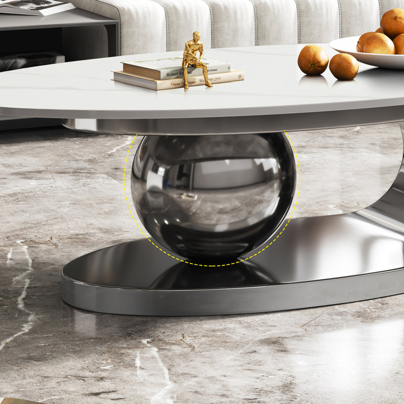 Table basse ovale moderne 49,2 po avec plateau en pierre frittée et base en acier inoxydable
