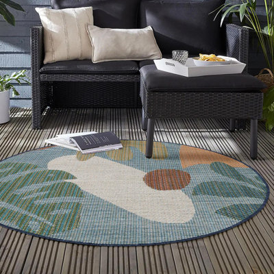 Tapis intérieur / extérieur bleu en polypropylène tissé à la machine Kiersten