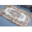 Tapis turc classique classique avec un élégant motif floral dans des tons de terre discrets pour un style de décoration traditionnelle