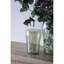 S / 2 vases décoratifs en verre vert avec motifs de visage