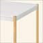 Table basse blanche et dorée