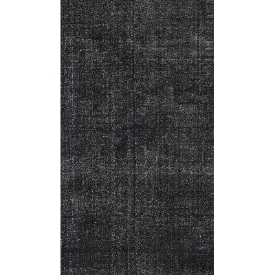 Tapis gris foncé en laine Dina