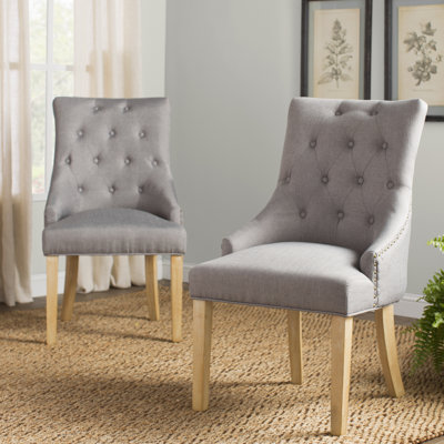 Fauteuil capitonné Authement