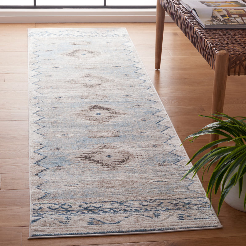 Tapis bleu / ivoire en polypropylène tissé à la machine Khi, Tapis de couloir 2 pi 2 po x 8 pi