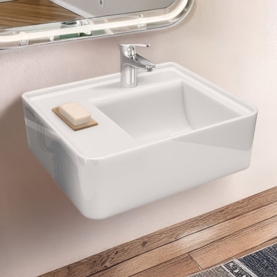 Lavabo de salle de bain mural rectangulaire de 22 po avec options de perçage de robinet et emplacement de drain central arrière Whitehaus Collection