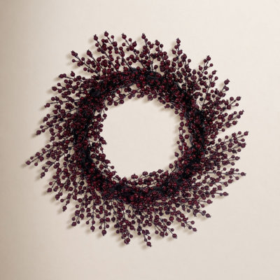 28" Burgundy Crab Apple Mixed Berry Wreath. This artificial wreath features vibrant burgundy berries and measures 28 inches wide. It is rated for indoor and outdoor use.
