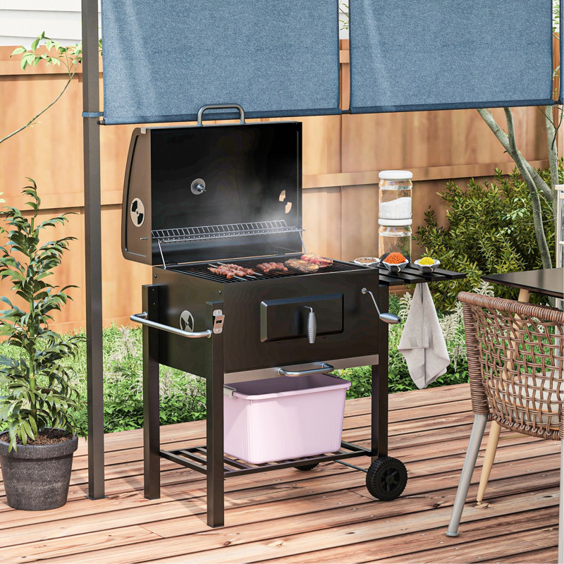 Barbecue au charbon de bois, barbecue de camping et pique-nique extérieur portable. Spacieuse surface de 21,75 po x 16,5 po, table d'appoint, tablette de rangement, roulettes, poignée, noir. Meilleure expérience de cuisson avec cuiseur à évents réglables