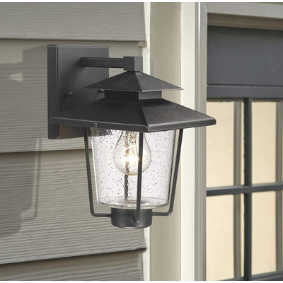 Knut Black 12.3'' H Seeded Glass Outdoor Wall Lantern -  Breakwater Bay, C867F8E01B7C4181B52F7F5F421AAB12