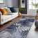 Chartier Machine Woven Floral Area Rug