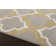 Tapis gris / jaune à motif géométrique