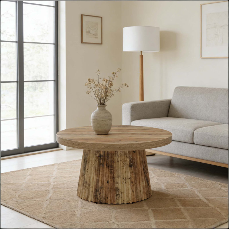 Table basse ronde à cannelures avec base cylindrique