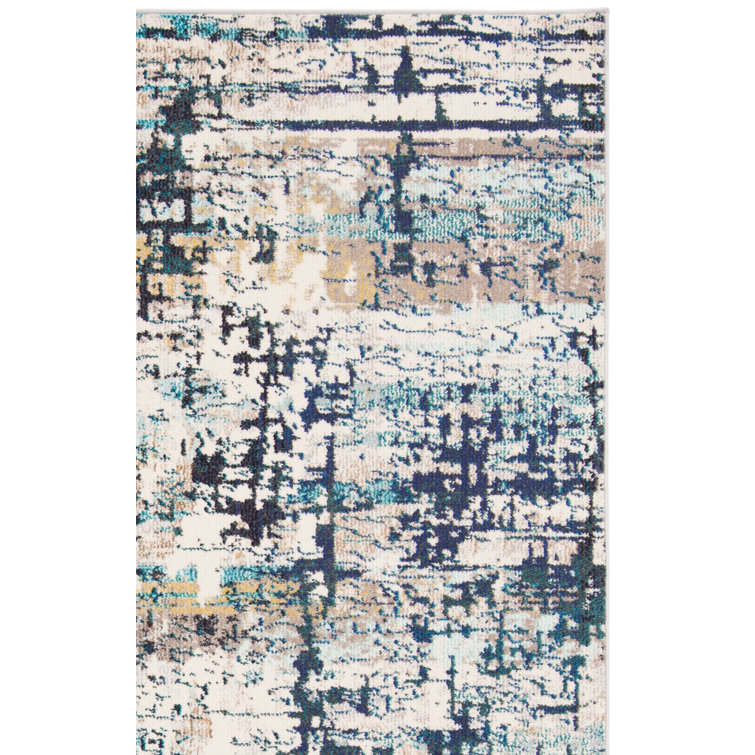 Tapis abstrait crème / bleu Felty